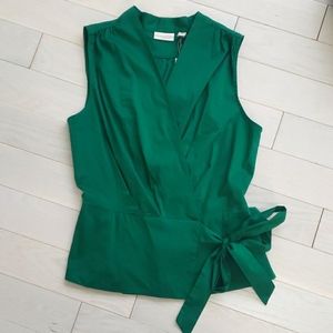 Green sleeveless top with side tie